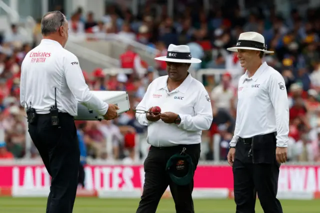 The umpires change the ball