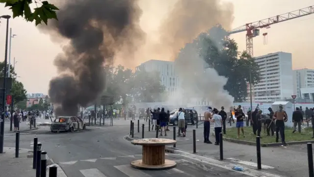 Vehicles are burnt following the death of a teenager killed by a French police officer