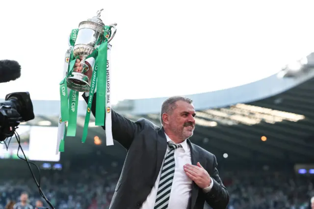 Postecoglou lifting trophy