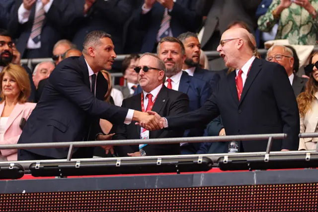 Avram Glazer shakes hands with Sheikh Mansour bin Zayed al-Nahyan