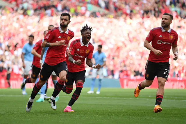 United celebrate the penalty