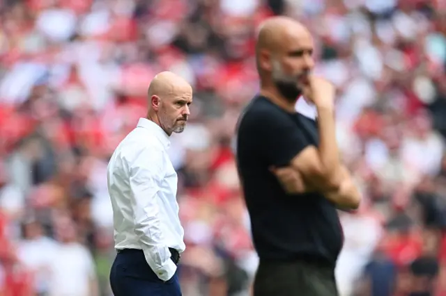 Ten Hag looks on