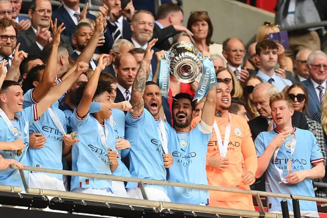 Gundogan lifts the FA Cup trophy