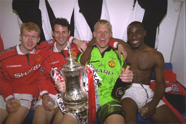 Peter Schmeichel and team mates celebrate winning the 1999 FA Cup