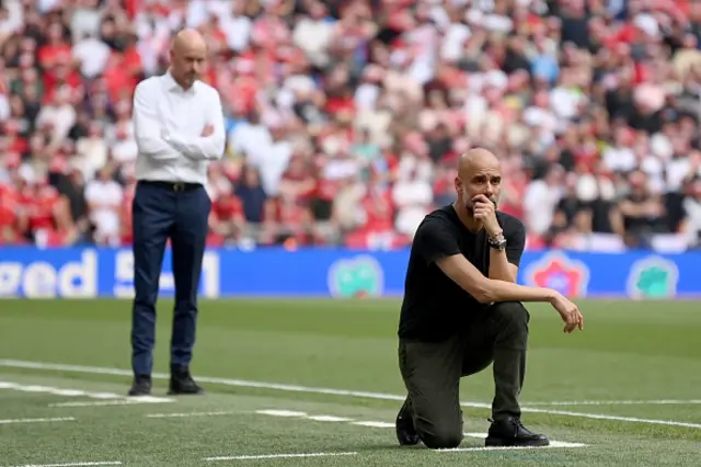 Pep looking down after United's equaliser