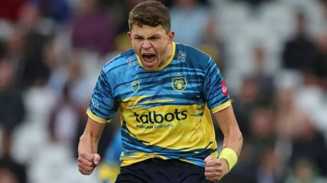 Henry Brookes celebrates a wicket