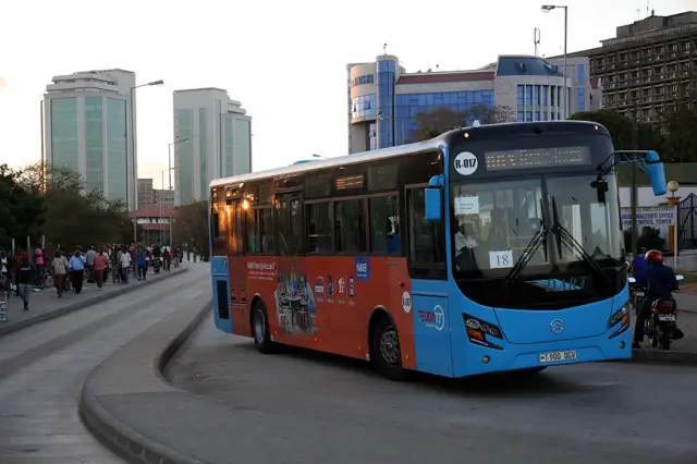 This picture taken on August 18, 2016 shows a Dart (Dar Rapid Transit) Bus driving in a street of Dar es Salaam.