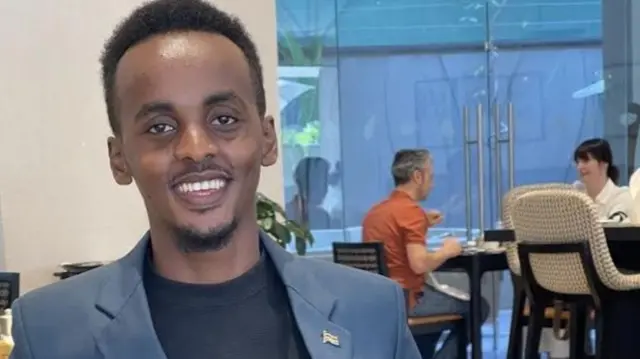 Ahmed Haji in a restaurant