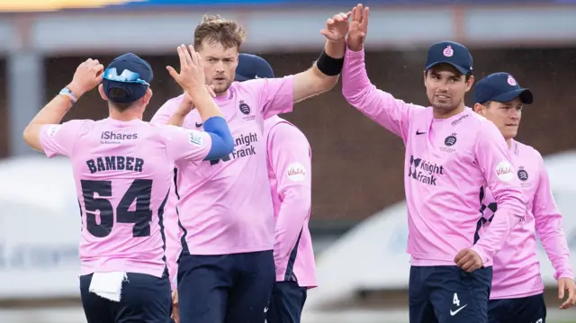 Middlesex celebrate a wicket