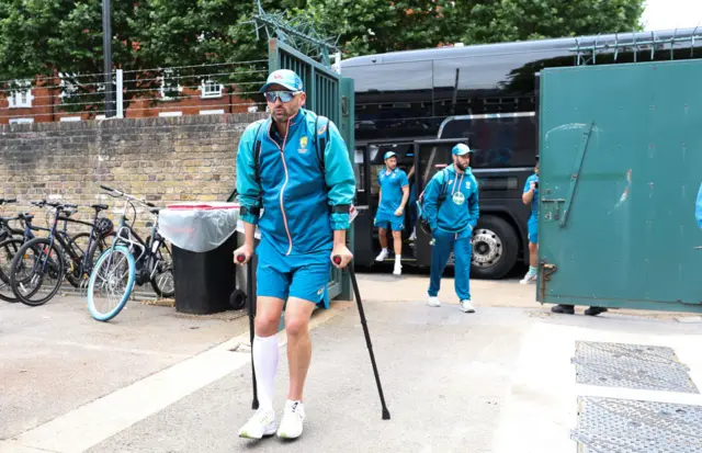 Nathan Lyon on crutches