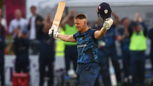 Tom Wood celebrates his century