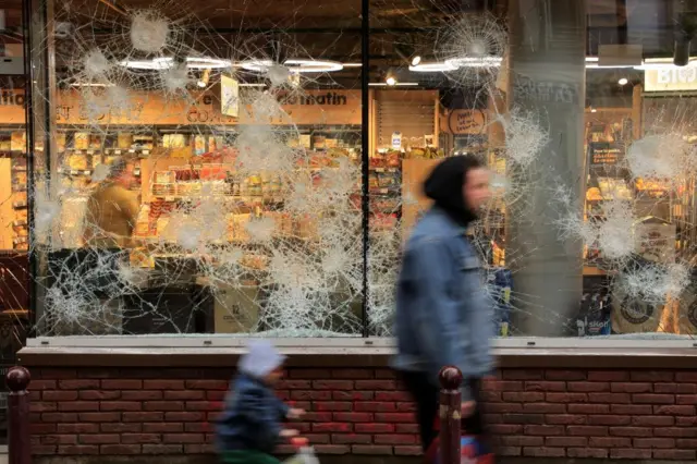 Shattered shop fronts in Lille