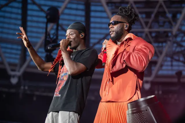 J Hus and Burna Boy on stage in London on 3 June.