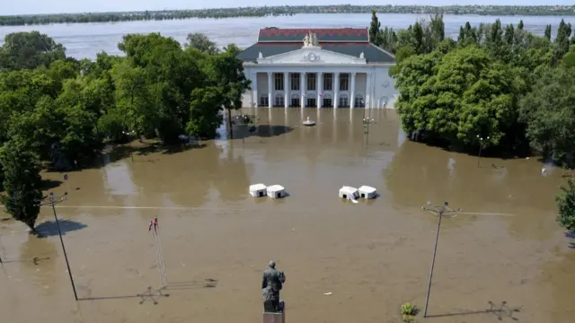 the House of Culture on a flooded street in Nova Kakhovka after the nearby dam was breached in the course of Russia-Ukraine conflict,