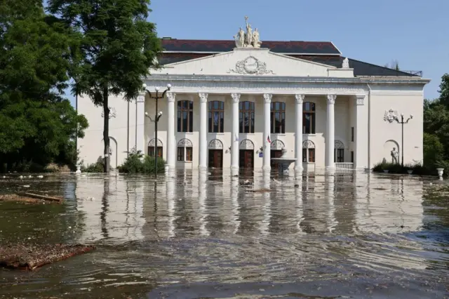 The House of Culture on a flooded street in Nova Kakhovka