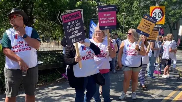 People are picketing across Wales including Bronglais Hospital, Aberystwyth