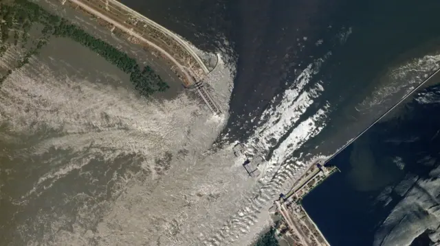 A satellite image shows the extent of the damage to the Kakhovka dam