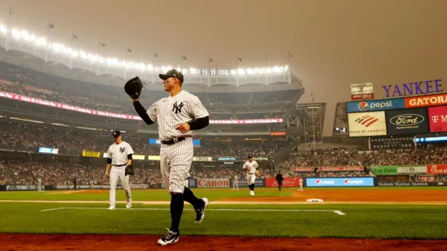 Anthony Rizzo of the New York Yankees jogs to the dugout during the second inning against the Chicago White Sox at Yankee Stadium.