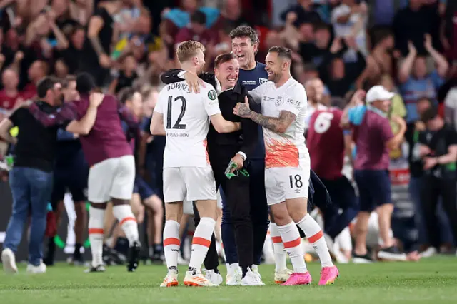 Mark Noble embraces Jarred Bowen and Danny Ings