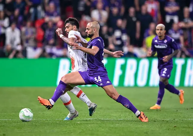 Amrabat battling in midfield against Pacqueta