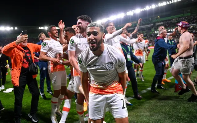 Benrhama celebrates in the corner where West Ham fans are