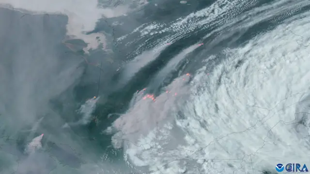 Satellite image showing the fires burning in Quebec and the smoke emanating from them