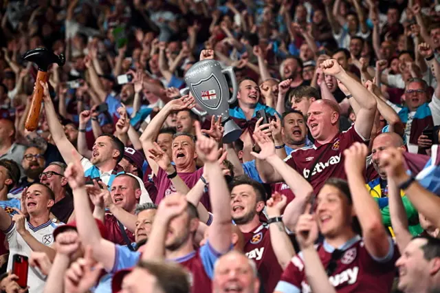 West Ham fans take in after being crowned champions