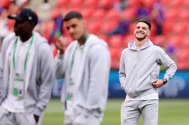 Declan Rice inspects the pitch in Prague