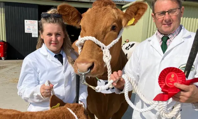 Owners Richard and Charisse Rowe with their cows