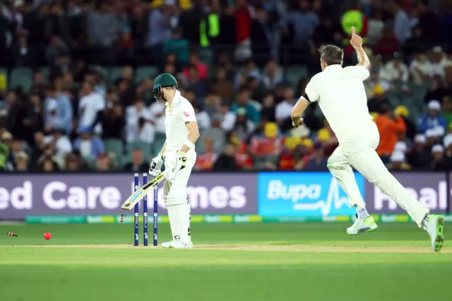 Craig Overton bowls Steve Smith