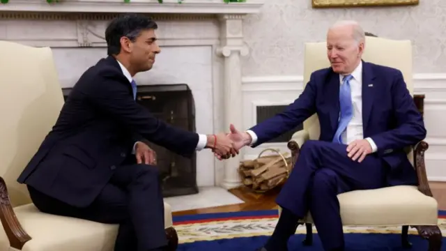 U.S. President Joe Biden and Britain's Prime Minister Rishi Sunak shake hands as they meet in the Oval Office at the White House in Washington, U.S., June 8, 2023.