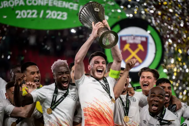 Declan Rice with the trophy