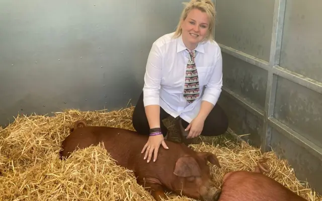 Hayley Loveless with her pigs at the show