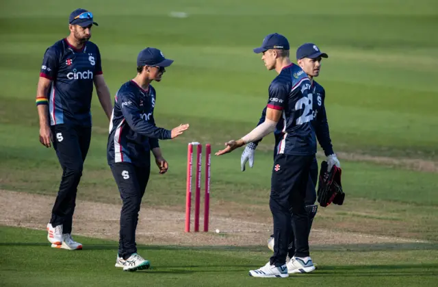 Northants fielders celebrate restricting Birmingham to 137 all out