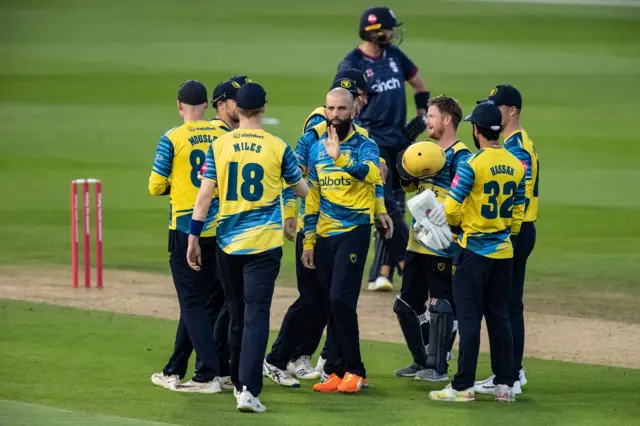 Birmingham Bears celebrate the wicket of Saif Zaib