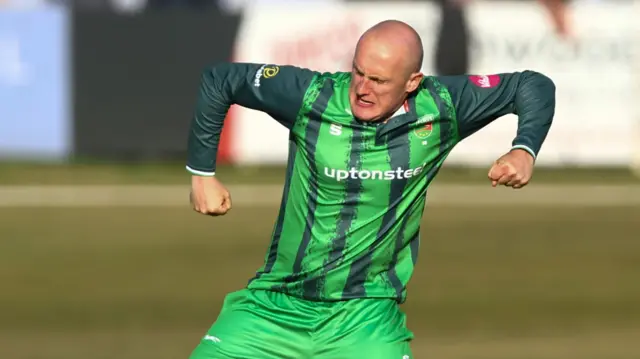 Leicestershire's Callum Parkinson celebrates a wicket