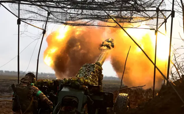 A Ukrainian soldier fires a cannon. File photo