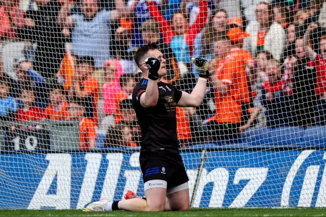 Rory Beggan celebrates after making the winning save during the penalty shoot-out