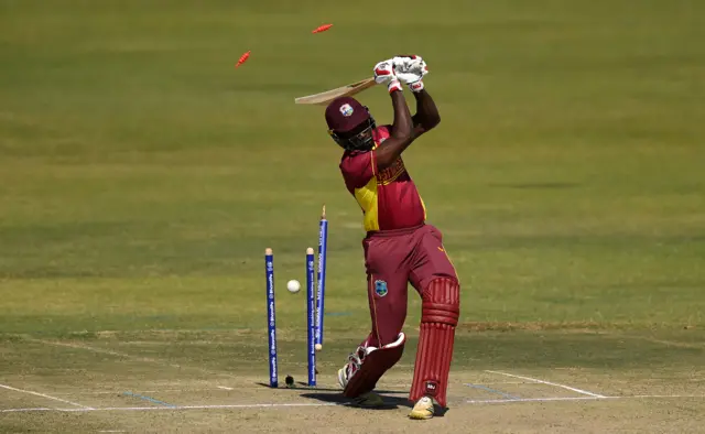 Chris Sole sends Kevin Sinclair's middle stump spiralling through the air