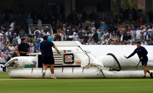 The hover cover being moved onto the square at Lord's