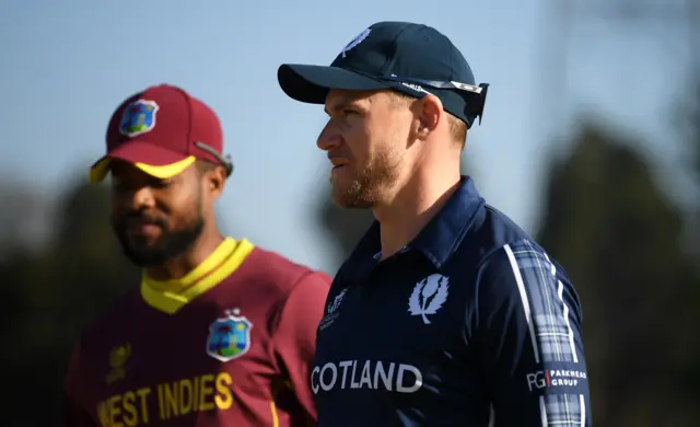 Richie Berrington wins the toss against the West Indies' Shai Hope