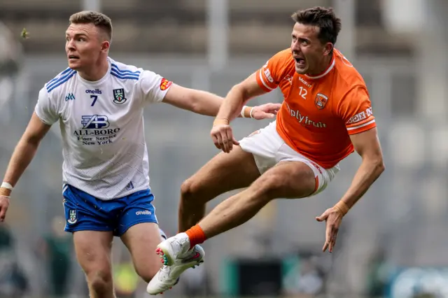 Conor McCarthy with Stefan Campbell as he follows his kick