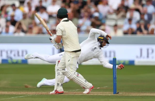 Joe Root taking a catch