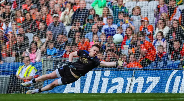 Rory Beggan saves a penalty during the penalty shoot-out