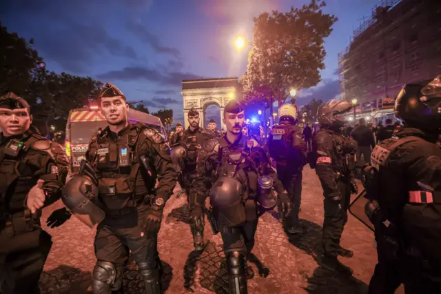 Police officers on the Champs-Élysées