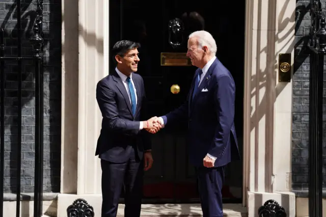 Biden shakes hands with Rishi Sunak outside Downing Street