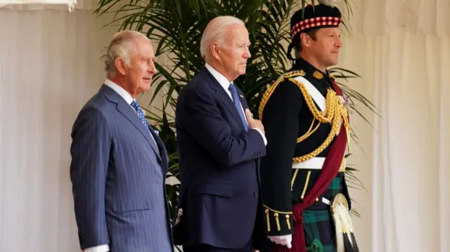 Biden and King Charles listened to the national anthem at Windsor Castle before they went in