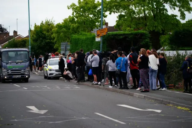 The scene outside the school earlier