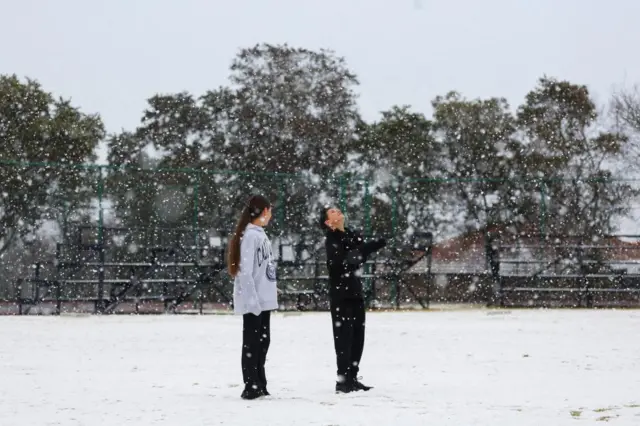 People in Johannesburg suburb playing in the snow