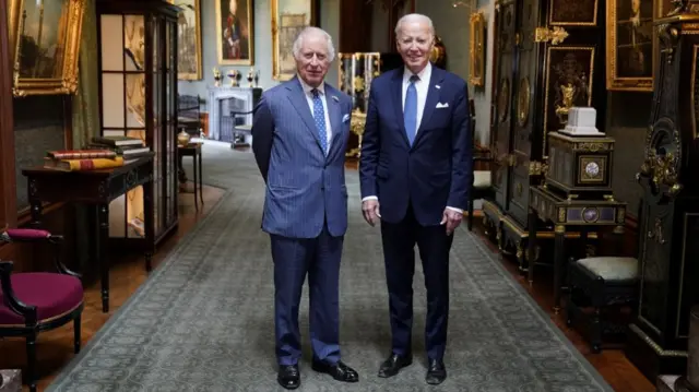 King Charles and U.S President Joe Biden in the Grand Corridor at Windsor Castle